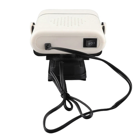 Compact battery operated car heater with swivel base and power switch for defrosting and cozy indoor use.