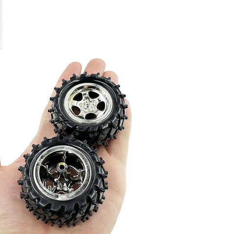 Hand holding 4 Pack Plastic Toy Car Wheels With Metal Shaft Axles For RC Cars Trucks And Robots DIY Model Projects 55mm Diameter