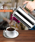 Pouring coffee from 34oz 304 stainless steel French press with insulated double wall carafe into cup