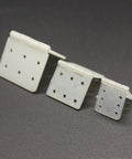 Three sizes of nylon hinges for RC airplanes skrnrhrery, showing square loose leaf design for aileron rudder and elevator surfaces.