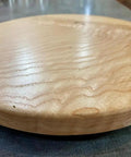 Close-up of the unpainted surface of 12 Inch Ash Wood Lazy Susan With Turquoise Painted Finish For Kitchen Island And Dining Table