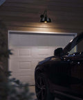 Gooseneck Barn Light Outdoor Fixture 12.6 Inch Farmhouse Vibe Black Exterior Sconce installed above garage door at night