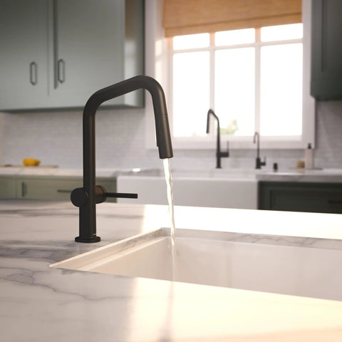hansgrohe Talis N Pull Down Kitchen Faucet, Modern, Magnetic Hand Sprayer, 1-Handle, 1.75 GPM, Matte Black, 72867671 with flowing water over a white sink.