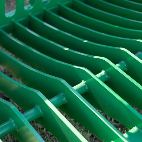 Close-up of 72 Inch Grade 50 Skeleton Rock Grapple Bucket For Tractors with Open Tine Design showing reinforced side cutters