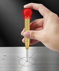 Slick Badass Automatic Center Punch For Metal And Woodworking, handheld steel tool marking a circle on metal surface.
