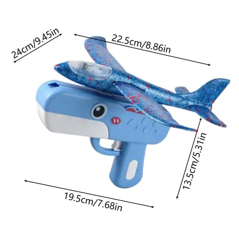 Foam Gliders For Backyard Fun And Outdoor Play Lightweight 7.68 Inch Foam Launchers For Kids Totally Easy Toss Soaring Summer Recreation Beach And Park Entertainment Safe Compact Planes That Boost Hand Eye Coordination toy set with 7.68 inch blue foam plane on launcher.