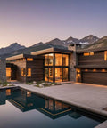Heavy Duty Reactive Wood Stain Coats Deck Boards In A Hella Rustic Ranch Worn Brown Finish While Pulling Rich Tones From Raw Wood Tannins Over Time Generating An Old School Patina That Weathers Smooth And Guards Your Favorite Outdoor Builds Daily house exterior with large windows and stone detailing overlooking a pool against a mountainous backdrop.