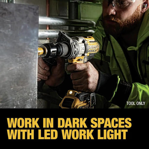 Man using 20V Max XR Brushless Drill/Driver With 3 Speed Modes, Tool Only, DCD991B with LED light in dark space