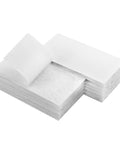 Stack of Stick On 2x4 Inch Hook And Loop Tape Set 12 Sets No Holes Or Screws Sticky Back Fastener in white with adhesive side visible
