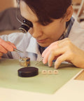 Person using 20 Piece Clock Nut Set For Repair And DIY Projects, Metal Movement Nuts And Gaskets To Stabilize And Regulate Clock Hands