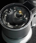 Close-up view of Smooth Operator 58Mm Handheld Coffee Stirrer gear mechanism for adjustable espresso needle distributor.