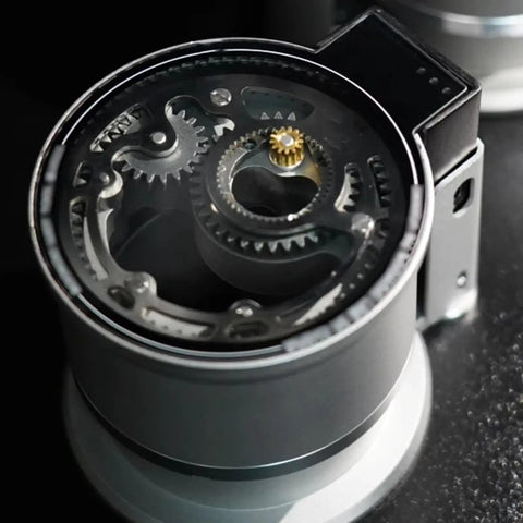 Close-up view of Smooth Operator 58Mm Handheld Coffee Stirrer gear mechanism for adjustable espresso needle distributor.