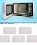 Open microwave with Five Piece Universal Microwave Mica Plate Set 4.6 By 2.5 Inch Waveguide Cover Heat Insulation Board displayed below.