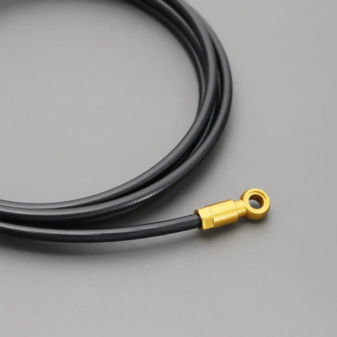 Close-up of Five Wire Hydraulic Brake Hose Set For Mountain Bikes With Dope Performance, gold connector, coiled view