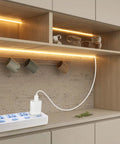 USB COB LED Strip Lights Warm White 3000K 5V 1M 320 LEDs Per Meter Flexible COB Tape illuminating a modern kitchen shelf