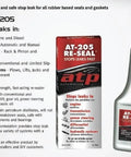 ATP AT-205 Reseal bottle and packaging, product for stopping automotive leaks and rejuvenating seals, visible text details.