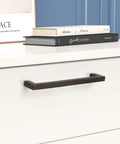 10 Pack Oil Rubbed Bronze Solid Zinc Cabinet Pulls, 5 Inch Center to Center, shown installed on a white cabinet drawer