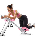 Your New Home Gym Essential With This Adjustable Ab Trainer Engineered For Rapid Belly Fat Burn And Rock Hard Core Gains Featuring Padded Knee Support Foldable Design For Quick Storage In Bright Pink in use.