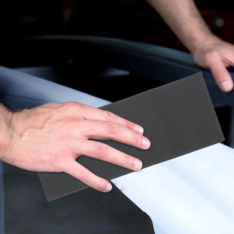 Dope 45 Sheet Wet Dry Sandpaper Set Ranging 120 To 5000 Grit for polishing auto surfaces and smoothing wood, showing usage.
