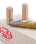 100 Count Solid Wood Dowel Pins Half Inch By Two Inch Kiln Dried Hardwood Fluted Beveled on wood base with drill bit.
