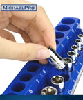 Hand placing socket in Magnetic Socket Organizer Tray Set For Metric Sockets Three Piece One Quarter Inch Drive Three Eighths Inch Drive And One Half Inch Drive High Capacity Holds Up To Seventy Five Sockets Keeps Your Toolbox Ready And Cabinets Sorted