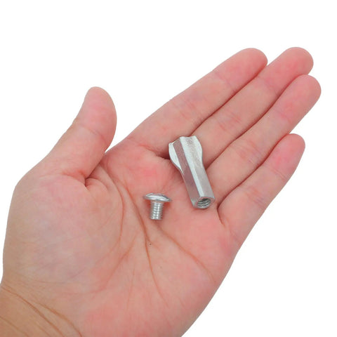 Hand holding two pieces from Eight Piece Hacksaw Bolt And Wing Nut Set For DIY Repairs Tough Pro Grade Hardware Kit