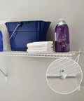 Essential White Down Wall Clips For Wire Shelving, Thirty Pack Plastic Brackets With Screws And Anchors, straight clip attached to wire shelf.