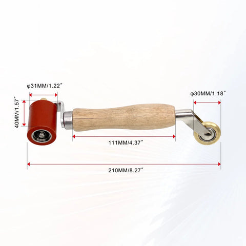Seam roller, side view with wooden handle; red silicone wheel (31mm) left, brass penny roller (30mm) right.
