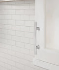 Side view of Cyprus 3 Inch Center To Center Polished Chrome Cabinet Pulls Set Of 10 for cabinets, showing sleek design and zinc construction.