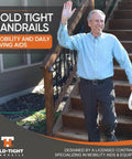 Built Tough Steel Wall Mount Handrail For Stairs And Decks, 18 Inch White Indoor Outdoor Safety Railing with a person using it.