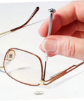 Person using a screwdriver to repair rimless glasses with 200Pcs Eyeglass Flat Washers Gaskets For Rimless Frames Metal Fasteners