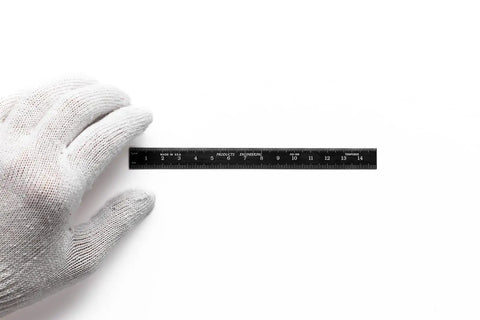 Kickass Flexible Metric Metal Ruler With Matte Black Chrome Coating and Heavy Duty Tempered Stainless Steel Frame with hand.