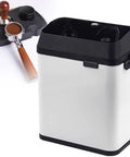 Electric Portafilter Cleaner And Knock Box With Built In Brush For Baristas Butter Smooth Grounds Disposal No Sweat Setup Game Changing Daily Espresso Cleanup Reliable Cafe Style Performance with black and silver design.