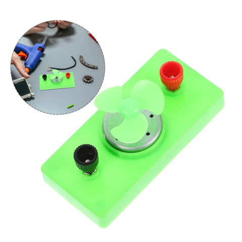 Dc Motor Diy Kit For Mini Wind Turbine Electric Generator Solar Powered Physics Project showing green base with blades and connectors.