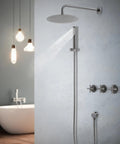 Shower System 10 Inch Wall Mounted Rainfall Head Combo with Handheld Spray on a minimalist bathroom wall.