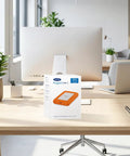 Rugged 5TB Portable External Hard Drive USB Three Point Zero And USB Two Point Zero Compatible, orange case next to computer