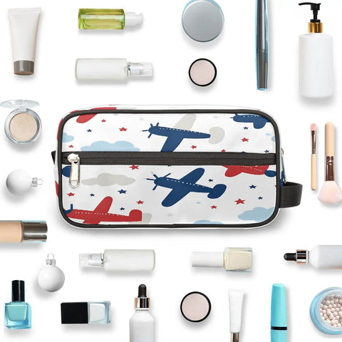 Adorable Airplane Travel Makeup Bag For Women And Men, Roomy Dopp Kit with airplane design, surrounded by toiletries.