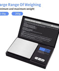 200g 0.01g Digital Pocket Scale With LCD Display, open lid showing quick start guide and weighing platform