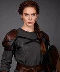 Woman wearing Battle Ready Leather Pauldron Shoulder Armor For Women, Viking Renaissance LARP Cosplay Gear In Brown