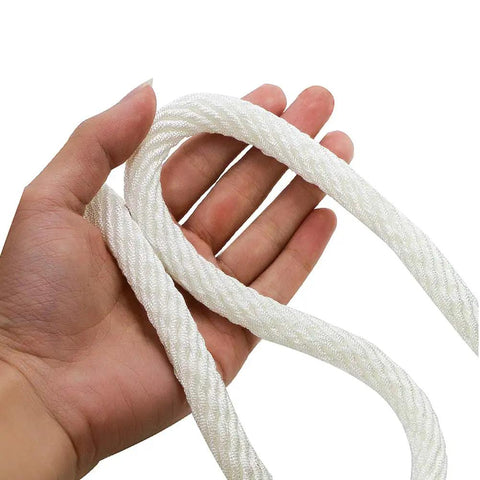 Hand holding Heavy Duty Nylon Rope Seven Eighths Inch By One Hundred Feet White Rope For Anchoring, Tree Work, Cargo Hauling