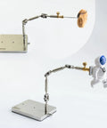 Stainless Steel Stop Motion Rig Arm With Five Flexible Joints For Smooth Animated Shots CNC Machined Armature Support Tool For Hobbyists And Studios Pro Grade Rig Holds Up To 280g shown holding figurines