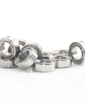 Miniature shielded ABEC-5 ball bearings, 4x7x2.5 mm, 10-pack, front view, metal outer race