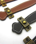 Two Pack Vintage Style PU Leather Cabinet Handles Zinc Alloy Drawer Pulls in brown and black, shown from above on white background