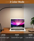 LED Desk Lamp With Clamp For Home Office 77 LEDs 3 Color Modes displaying color temperature on desk with laptop