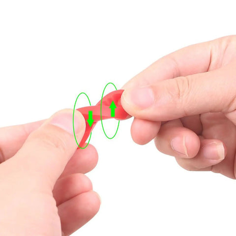 Set Of Four Silicone Auto Door Dampers Knock Out Heavy Slam Noise And Vibes With Grippy Hold, showcasing a person stretching a red silicone damper.