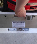 Heavy Duty 2 Wheel Alignment Tool For Camber Caster And Toe With Knockout Precision Wheel Standoffs held by a person.