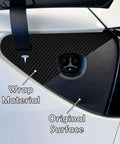 Premium Carbon Fiber Charge Port Wrap For Tesla Model 3 And Model Y Featuring Dope 3D Textured Surface And Straight Up Five Minute Install Fresh Exterior Trim Upgrade, close-up view showing wrap material.