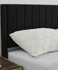 Ultra Comfy Queen Platform Bed Frame With Cozy Velvet Upholstered Headboard showcasing plush vertical stripes and a decorative pillow.