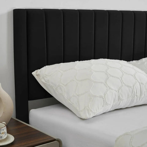 Ultra Comfy Queen Platform Bed Frame With Cozy Velvet Upholstered Headboard showcasing plush vertical stripes and a decorative pillow.
