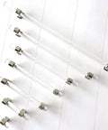 Sleek Lucite Acrylic Cabinet Pulls in Clear Chrome Finish, 4.75 Inch Center-To-Center, displayed on a white background.